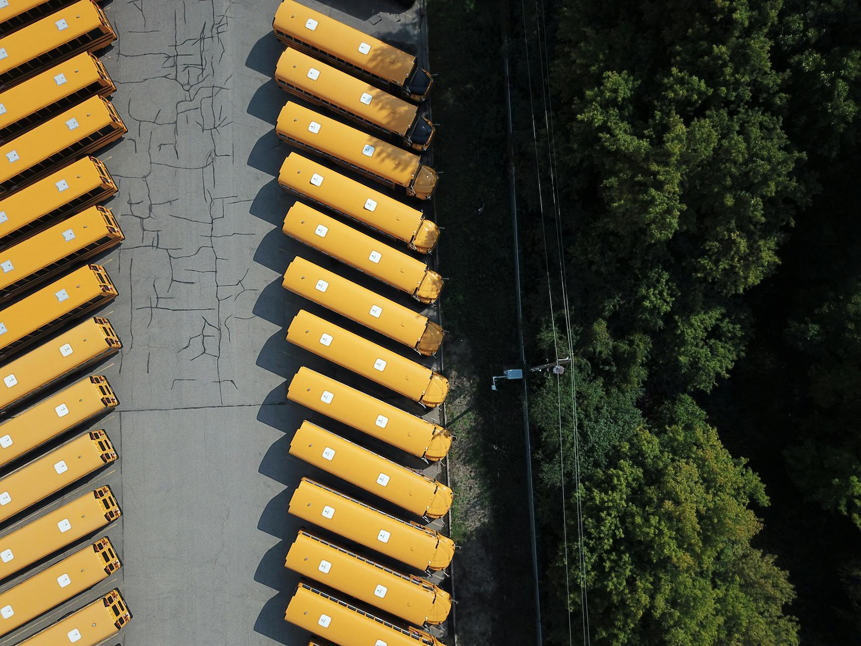 top view of yellow trucks in the parking lot